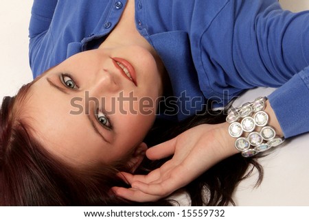 A woman laying on the floor