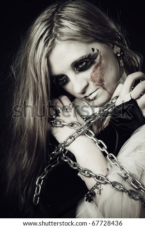 stock photo Cute gothic girl in chains