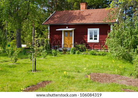 Idyllic red summer cottage.