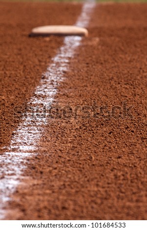 Chalk Line to First Base; focus on chalk line with base in background