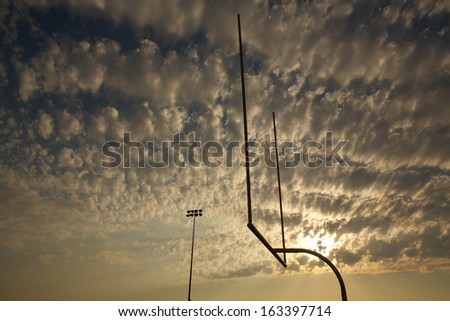 American Football Goal Posts or Uprights at Sunrise