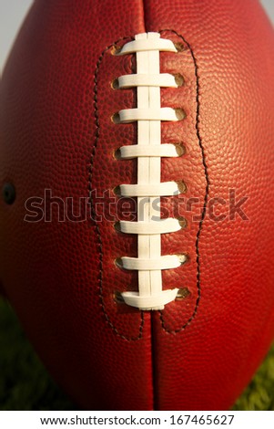 Pro Football Close Up with Focus on the Laces for Sports Background