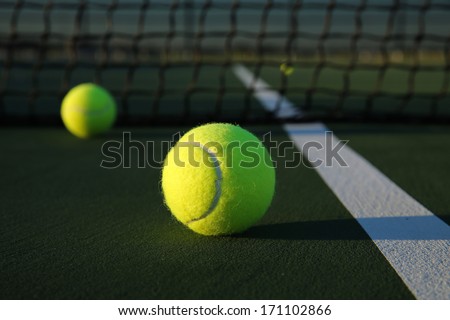 Tennis Balls on the Court Close up with room for copy