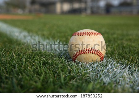 Baseball on the Outfield Chalk Line with room for copy
