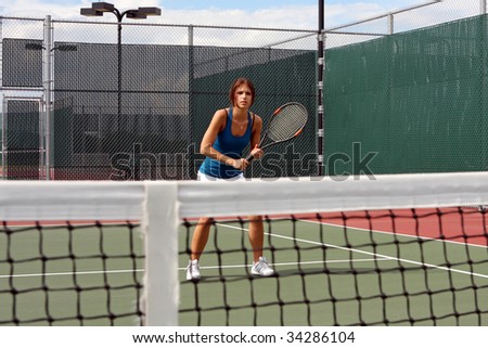 Female Tennis player awaiting a volley