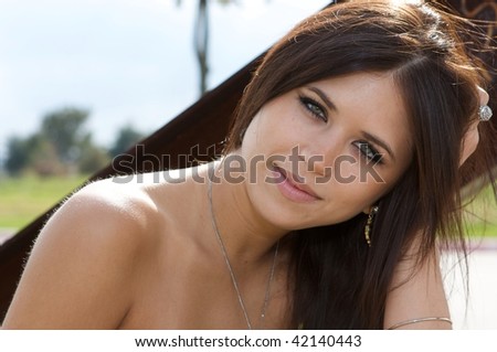 Young Beautiful Brunette Woman Grinning