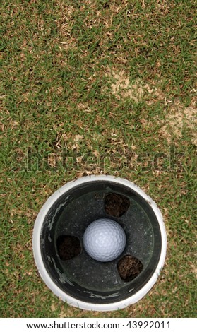 Golf Ball in the Hole with Room for Copy Above
