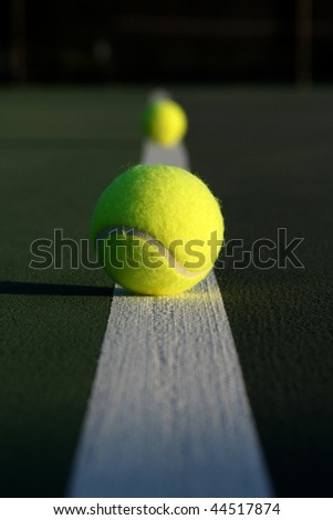 Tennis Balls on the Court Line