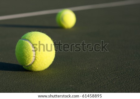Tennis Balls on the Court with room for copy