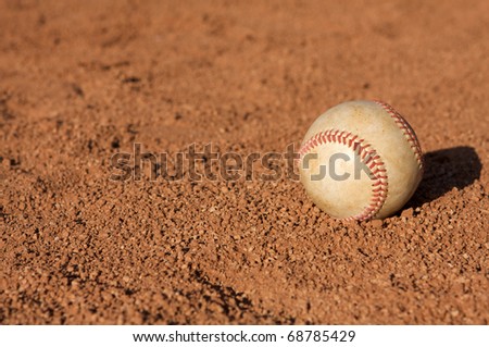 Baseball on the Infield Dirt with Room for Copy