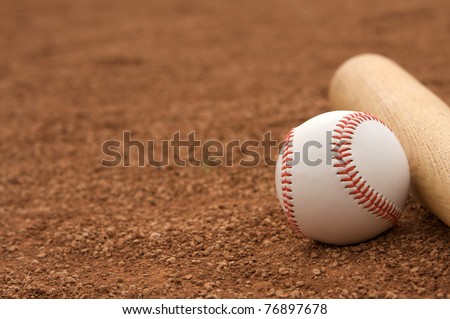 Baseball & Bat on the Infield Dirt with room for copy