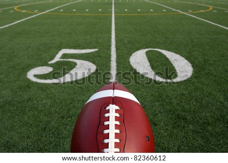 American Football with the Fifty Yard Line and room for copy