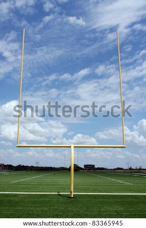 Football Field Goal Posts with a cloudy sky