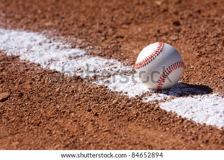 Baseball on the Chalk Line of the Infield with room for copy
