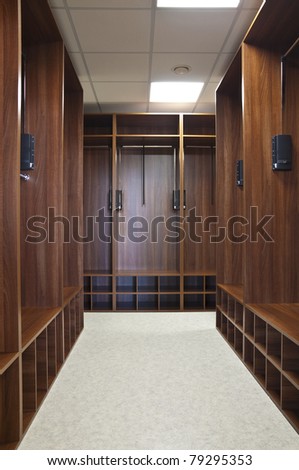 Small clean cloakroom. gray floor and ceiling