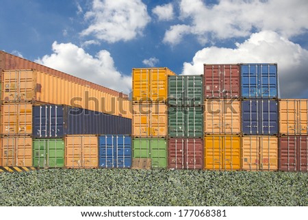 Stacked cargo containers in storage area of freight sea port