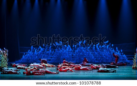 CHENGDU - NOV 18: Chinese dancers perform modern dance drama onstage at JINCHENG theater on Nov 18, 2010 in Chengdu, China.
