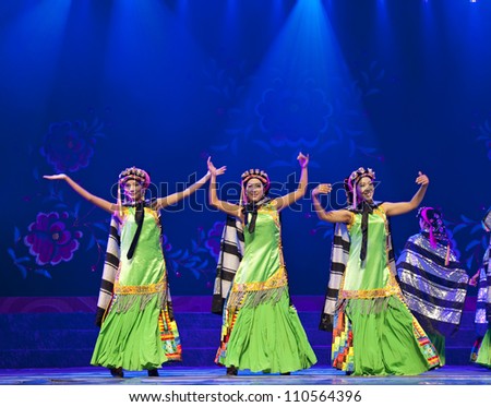 CHENGDU - SEP 27: chinese Tibetan ethnic dancers perform on stage at experimental theater.Sep 27,2010 in Chengdu, China.