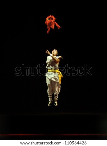 CHENGDU - JUN 6: Chinese Mulian Drama actor performs on stage to compete for awards in 25th Chinese Drama Plum Blossom Award competition at Experimental theater.Jun 6, 2011 in Chengdu, China.