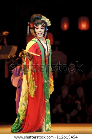 CHENGDU - JUN 4: chinese Sichuan opera performer make a show on stage to compete for awards in 25th Chinese Drama Plum Blossom Award competition at Xinan theater.Jun 4, 2011 in Chengdu, China.