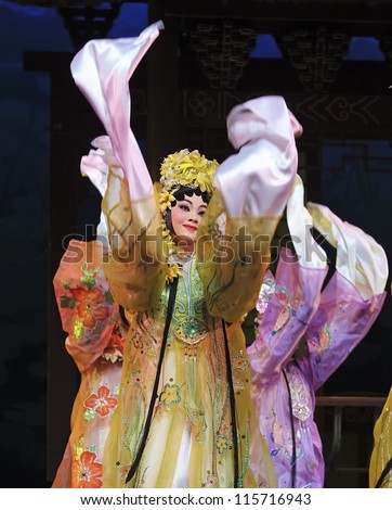 CHENGDU - JUN 3: chinese Cantonese opera performer make a show on stage to compete for awards in 25th Chinese Drama Plum Blossom Award competition at Jinsha theater.Jun 3, 2011 in Chengdu, China.