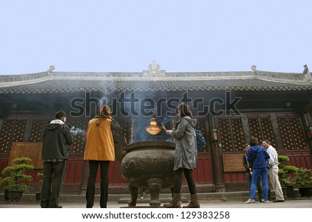 CHENGDU - APR 8: Buddhists  pray in Wenshu Monastery on Apr 8, 2012 in Chengdu, China.
