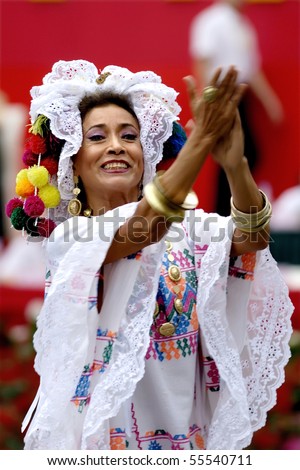 CHENGDU - MAY 23: Mexican dancer with castanets in the 1st International Festival of the Intangible Cultural Heritage China, on May 23, 2007 in Chengdu, China.