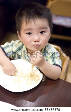 eating baby to grab pasta