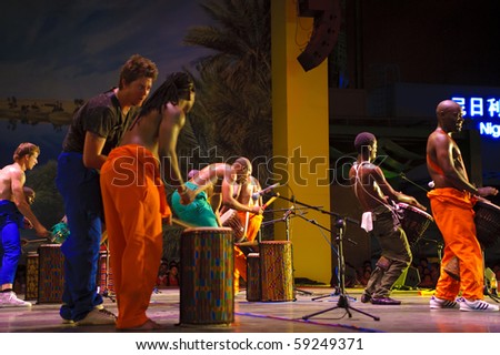 SHANGHAI - AUG 7: African artist perform folk music in Expo 2010 Shanghai China AUG 7, 2010 in ShangHai,China.