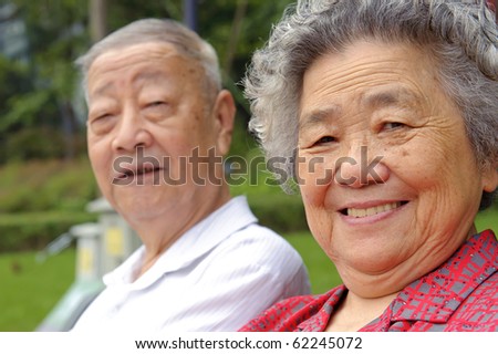 portrait of happy grandfather and grandmother