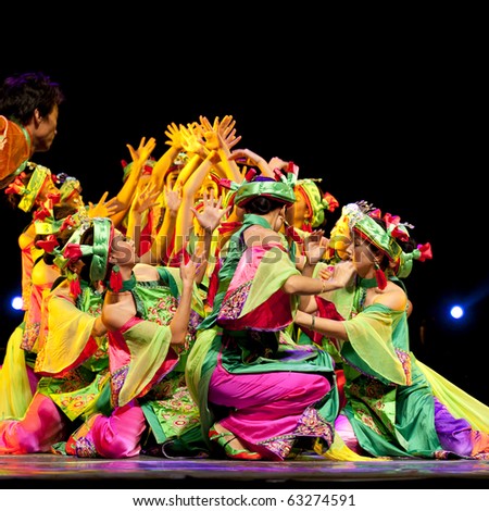 CHENGDU - SEP 28: chinese Qiang ethnic dance performed by song and dance troupe of Aba Tibetan and Qiang autonomous prefecture at experimental theater.Sep 28, 2010 in Chengdu, China.