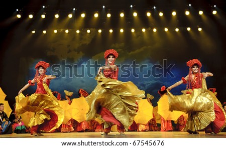 CHENGDU - SEP 26: chinese Yi ethnic dance performed by song and dance troupe of Liangshan Yi autonomous prefecture at JIAOZI theater.Sep 26,2010 in Chengdu, China.