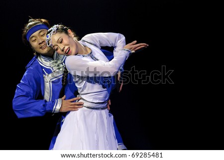 CHENGDU - DEC 10:  Inner Mongolia Ulan Muqir art troupe perform Duo dance \
