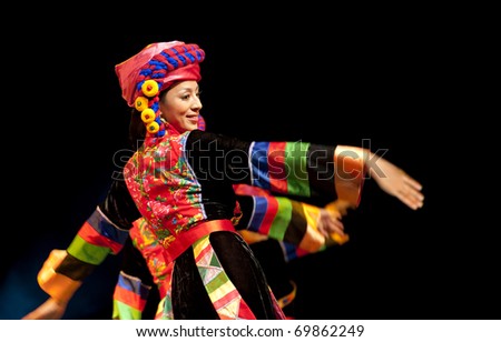 CHENGDU CHINA - SEPT. 28: Chinese Qiang Ethnic Dance is performed by song and dance troupe of Aba Tibetan and Qiang autonomous prefecture at the experimental theater on Sept. 28, 2010 in Chengdu, China.