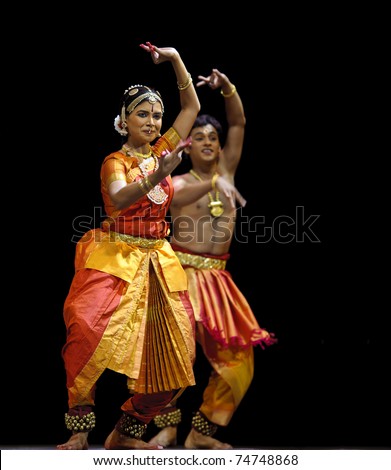 CHENGDU, CHINA - OCT 24: Indian dancers perform folk dance onstage at JINCHENG theater during the festival of India in china on Oct 24,2010 in Chengdu, China.