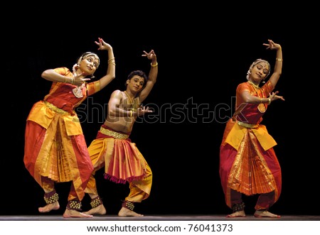 CHENGDU, CHINA  - OCT 24: Indian dancers perform folk dance onstage at Jincheng theater during the festival of India in China on Oct. 24, 2010 in Chengdu, China.