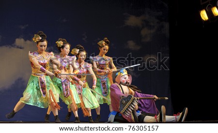 CHENGDU, CHINA - JULY 23: Chinese opera actors perform traditional drama onstage at Arts Academy theater of Sichuan  on July 23, 2010 in Chengdu, China.