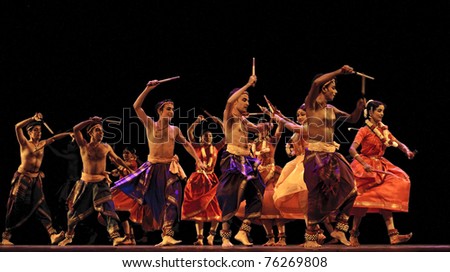 CHENGDU, CHINA - OCT 24: Indian dancers perform folk dance onstage at JINCHENG theater during the festival of India in China on Oct. 24, 2010 in Chengdu, China.