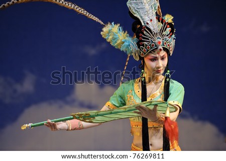 CHENGDU, CHINA - JULY 23: Chinese opera actress performs traditional drama onstage at Arts Academy theater of Sichuan on July 23, 2010 in Chengdu, China.
