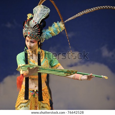 CHENGDU - JULY 23: Chinese opera actress performs traditional drama onstage at Arts Academy theater of Sichuan Jul 23, 2010 in Chengdu, China.
