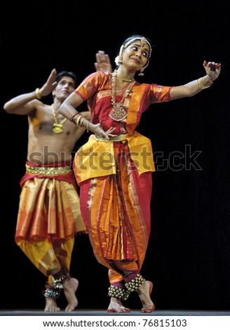 CHENGDU, CHINA - OCT 24: Indian dancing girl performs folk dance onstage at JINCHENG theater during the festival of India in China on Oct. 24, 2010 in Chengdu, China.