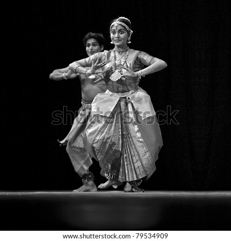 CHENGDU - OCT 24: Indian dancing girl performs folk dance onstage at JINCHENG theater during the festival of India in china on Oct 24,2010 in Chengdu, China.