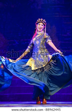 CHENGDU - SEP 27: chinese Tibetan ethnic dancer performs on stage at experimental theater.Sep 27,2010 in Chengdu, China.