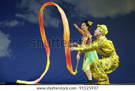 CHENGDU - JULY 23: Chinese opera actors perform traditional drama onstage at Arts Academy theater of Sichuan Jul 23, 2010 in Chengdu, China.