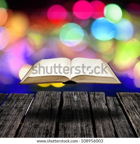 Mystery flying book with the nice color light background, Education inspiration concept
