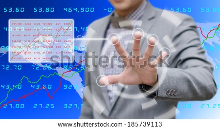 Businessman searching the stock exchange data
