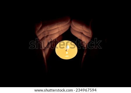 Candle in the hand, Hope and pray concept