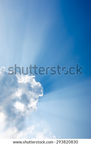Nice sun beam shining through clouds sky