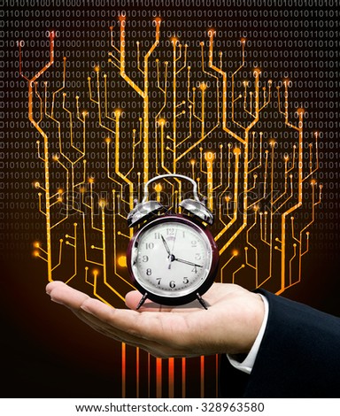 Time machine concept, Clock on hand with circuit board graphic background