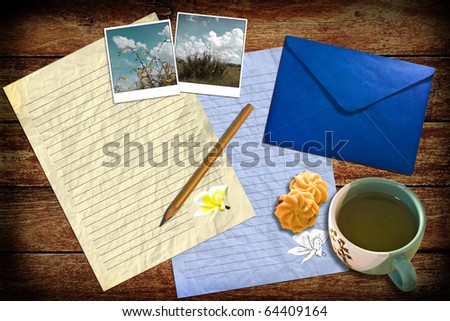 Letter accessories with tea on table
